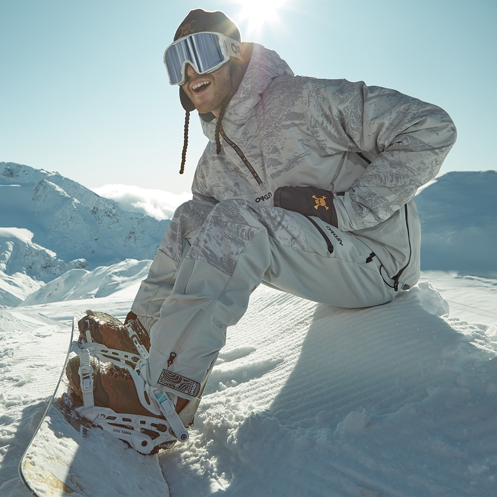 Man wearing Oakley jacket and goggles