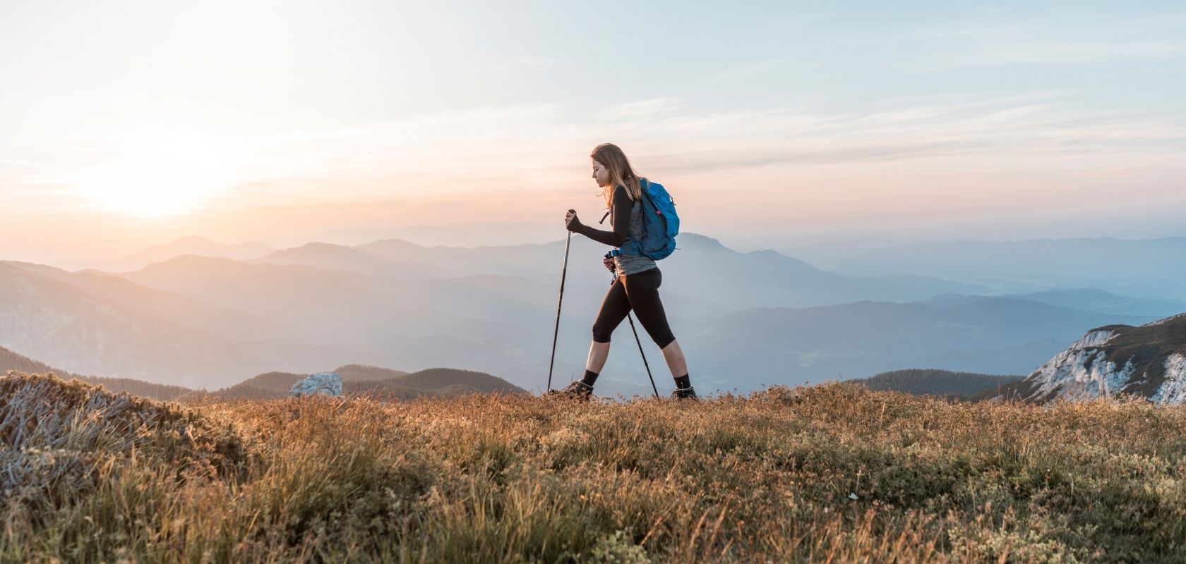 An image of a woman on a hike