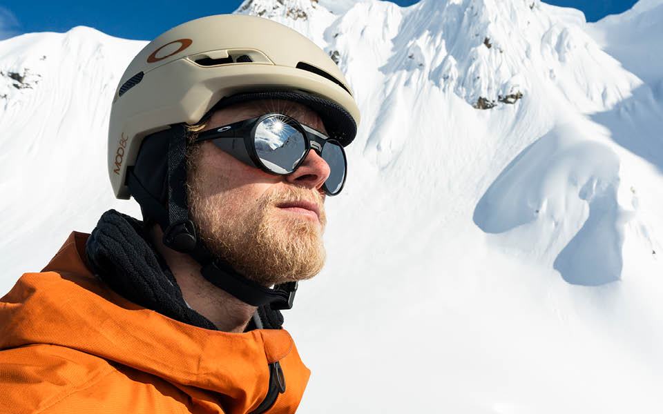Man wearing Oakley black sunglasses