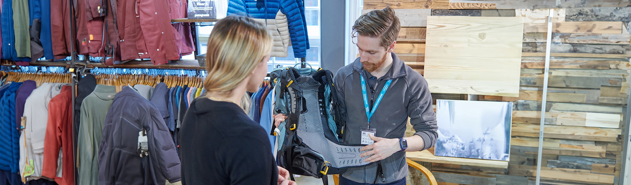 Book an appointment - a woman getting advice from in-store expert